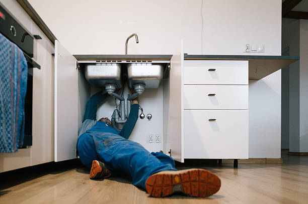Professional Drain Cleaning technician working in Collins, IA